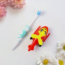 children’s toothbrush and helicopter set